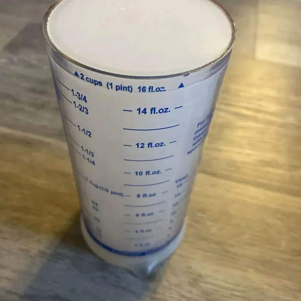 The Pampered Chef Measure-All Dry/Wet Measuring 2 Cup Push-Up Design #2225